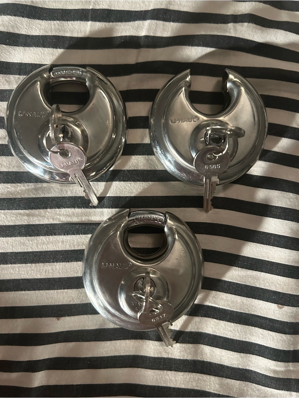 U HAUL Three Silver Disc Padlock with Keys